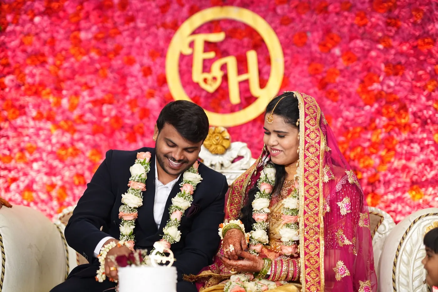 Fathima and Hasnad sharing a joyful moment during their engagement ceremony