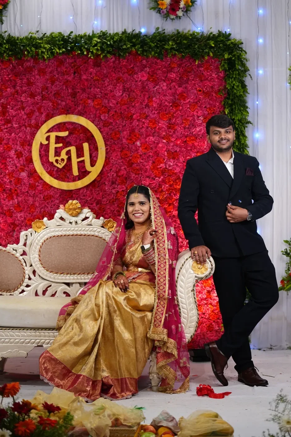 Full-length portrait of Fathima and Hasnad at their engagement