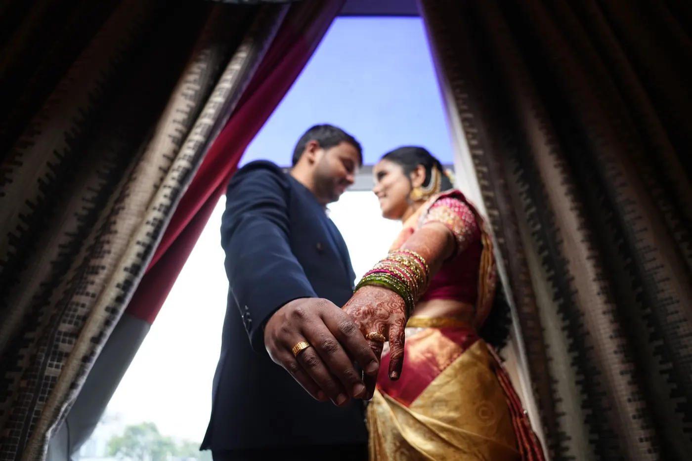 Close view of Fathima and Hasnad holding hands